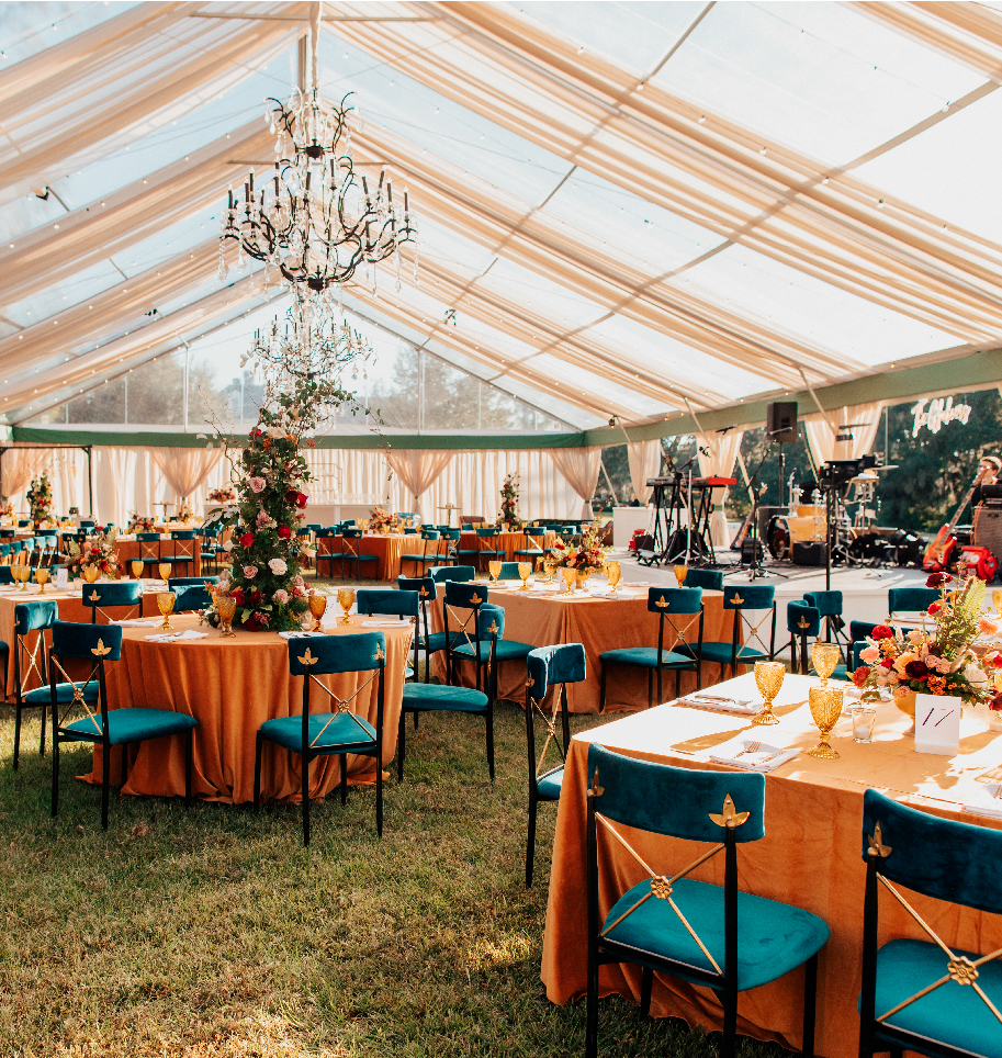 Elegant wedding reception setup under a tent